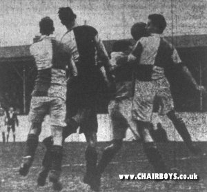 Action from the game at Newbury Park - photo from The Topical Press