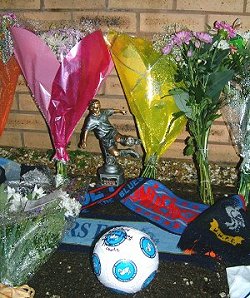 Tributes left at Adams Park for Mark - including Sergio Torres Man of the Match award from the Notts County game