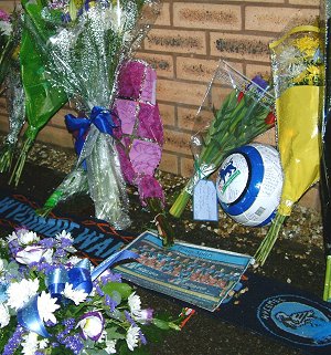 Tributes left at Adams Park for Mark