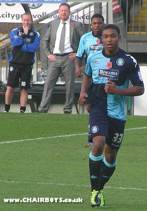 Jordon Ibe watched by fellow youngster Kadeem Harris, Manager Gary Waddock and Assistant Richard Dobson