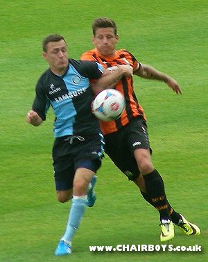 Josh Scowen in action at Barnet prior to his injury