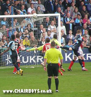 Alfie Mawson goes close against Morecambe with a header that hit the crossbar