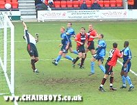 Darren Currie's free-kick is tipped over by Neil Moss in the Bournemouth goal