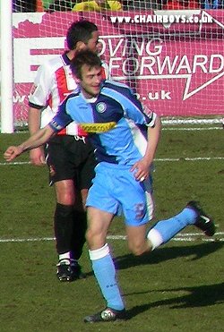 Roger Johnson celebrates his goal at Cheltenham