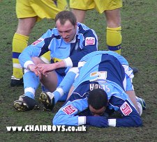 Charlie Griffin and Danny Senda can't believe it as Torquay keep out Wanderers attempts of a late equaliser