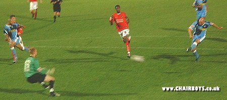 Tommy Mooney makes the score 3-1 to Wycombe