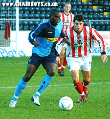 Richard Harris back on his feet and with the ball