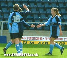 Su Oakley takes the congratulations from her team mates