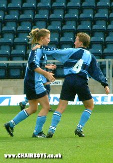 Marion Lyon (No.4) says well done to Su