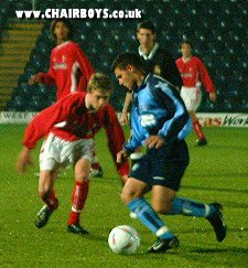 James Rogers on the ball against Swindon