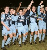 Wycombe players celebrate after defeating Wolves - picture Paul Dennis