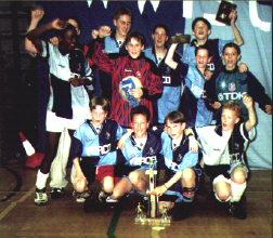 The delighted youngsters show off their trophies and medals
